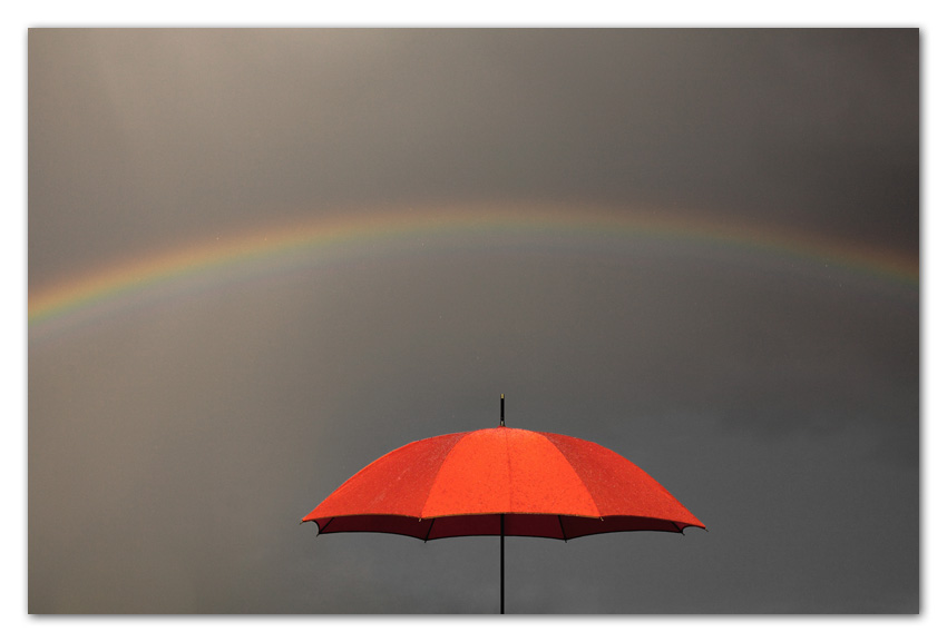 03Stock Rainbows over red umbrella Flagstaff Arizona